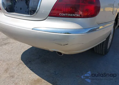 2002 Lincoln Continental из США, поврежденный, VIN 1LNHM97V72Y688477